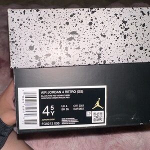 Jordan 4 Retro GS in Black and Red